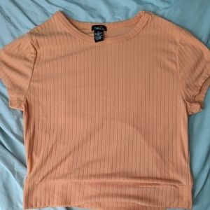 Orange crop top with open back